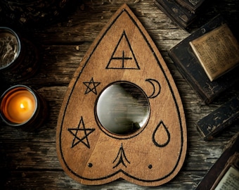 Ouija, drop pointer planchette, spiritualism or mystical or gothic decorative accessory, esoteric engraving on wood Vintage Object