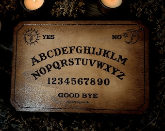 Authentic Ouija board, Mystifying Oracle, wood engraving. Vintage Ouija board in period style.