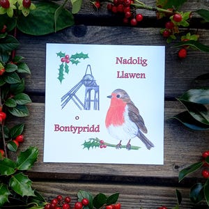 Carden Nadolig Cymraeg.  Nadolig Llawen of Bontypridd.  Welshe kerstkaart.  Vrolijk kerstfeest van Pontypridd.  Vierkante kaart van 150 mm.  Afdrukken.