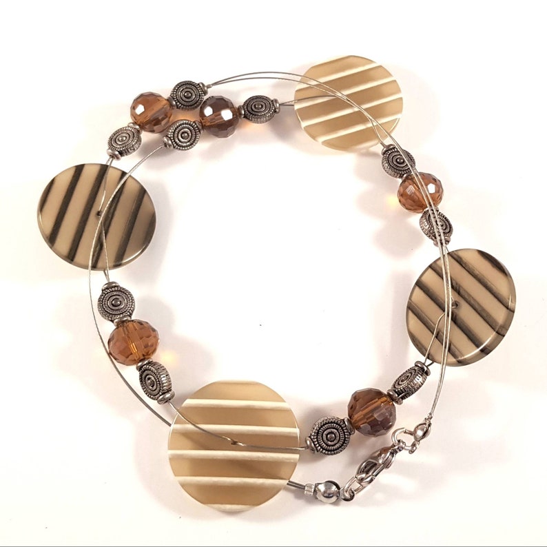 Necklace in brownbeige jewelry wire buttons and beads