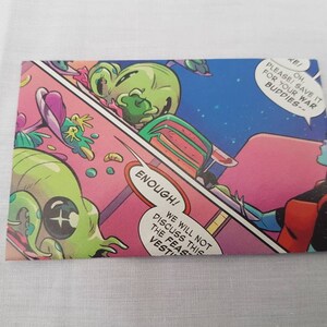 May include: A comic book panel featuring a green alien with a large eye and a pink background. The alien is saying "ENOUGH! WE WILL NOT DISCUSS THIS THE FEAST VESTI".  Another alien is saying "PLEASE SAVE IT FOR YOUR WAR BUDDIES-- OH!"