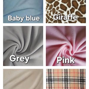 K&ouml;nnte beinhalten: Ein Raster aus sechs Stoffmustern mit verschiedenen Farben und Mustern. Die Muster umfassen einfarbiges Babyblau, einen braun-wei&szlig;en Giraffendruck, einfarbiges Grau, einfarbiges Rosa, einfarbiges Steingrau und ein klassisches Tartanmuster in Beige, Schwarz und Rot.