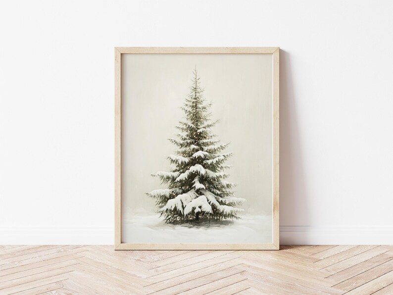 May include: A framed print of a snow-covered evergreen tree against a white background.