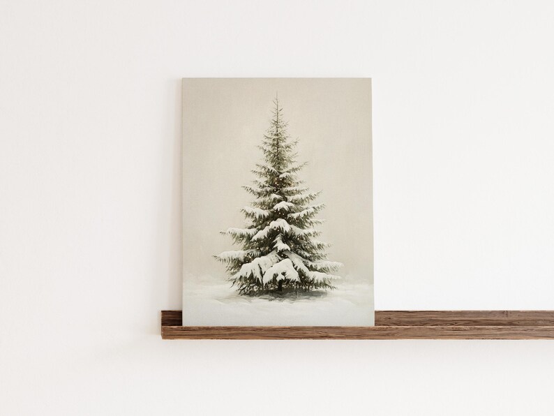 May include: A snowy evergreen tree stands tall against a muted beige background. The tree is covered in a light dusting of snow, and the branches are spread out in a symmetrical pattern.