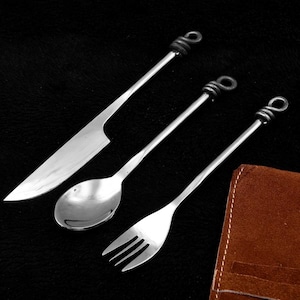 Hand-forged medieval cutlery set knife from 1095. Handle rolled 4147