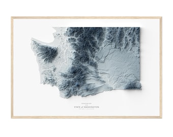 May include: A 3D relief map of the state of Washington, showing the elevation of the land. The map is printed in shades of blue and white, with the highest elevations shown in dark blue. The map is framed in a light wood frame.