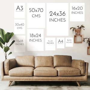 May include: A display of various sized white art prints, including 16x20 inches, 18x24 inches, 12x18 inches, 11 x 14 inches, and 8x10 inches. Other sizes include A3, 50x70 cm, 30x40 cm, and 24x36 inches. The prints are displayed on a white wall above a brown leather sofa.