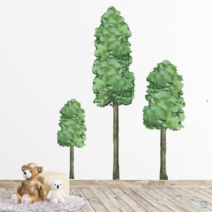 May include: Three watercolour tree wall decals in various sizes. The decals are green and feature a simple, stylised tree design. The decals are perfect for adding a touch of nature to any room.