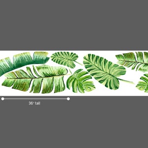 May include: Watercolor illustration of tropical leaves in shades of green and yellow. The leaves are arranged on a white background and are 36 inches tall. The image features various leaf shapes, including banana leaves and monstera leaves.