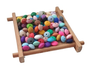 Flat silicone bead, lens bead, separation bead necklace attachment