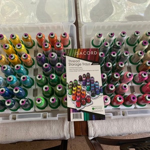 72 spools of Isacord embroidery thread with cases and snap in case inserts