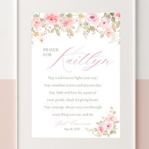 May include: A pink floral printable with the text "PRAYER FOR Kaillyn" and a prayer for a child's first communion. The text reads: "May God forever light your way. May sunshine warm each joyous day. May faith and love be a part of your gentle, kind, forgiving heart. May courage always see you through everything you say and do. First Communion May 18, 2025"