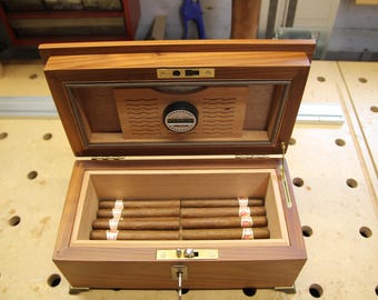 Editor's Picks: Cigar Humidor, Surfboard and Pure Gold Spectacles