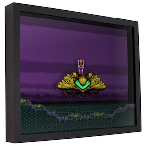 May include: A pixelated 3D diorama of a video game scene featuring a pink and green character standing on a yellow spaceship against a purple and blue background. The scene is set in a green and brown landscape.