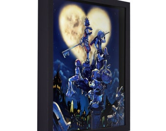 May include: A framed print of a group of cartoon characters standing on a rooftop under a heart-shaped moon. The characters are from the Kingdom Hearts video game series. The print is in a black frame.