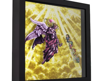 May include: A framed pixel art print of a winged, purple-skinned character with a golden halo, standing against a yellow and white background. The character is surrounded by smaller pixel art characters.