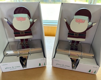 Santa Enamel and Silver Place and Time Mantel Stocking Holder Pair