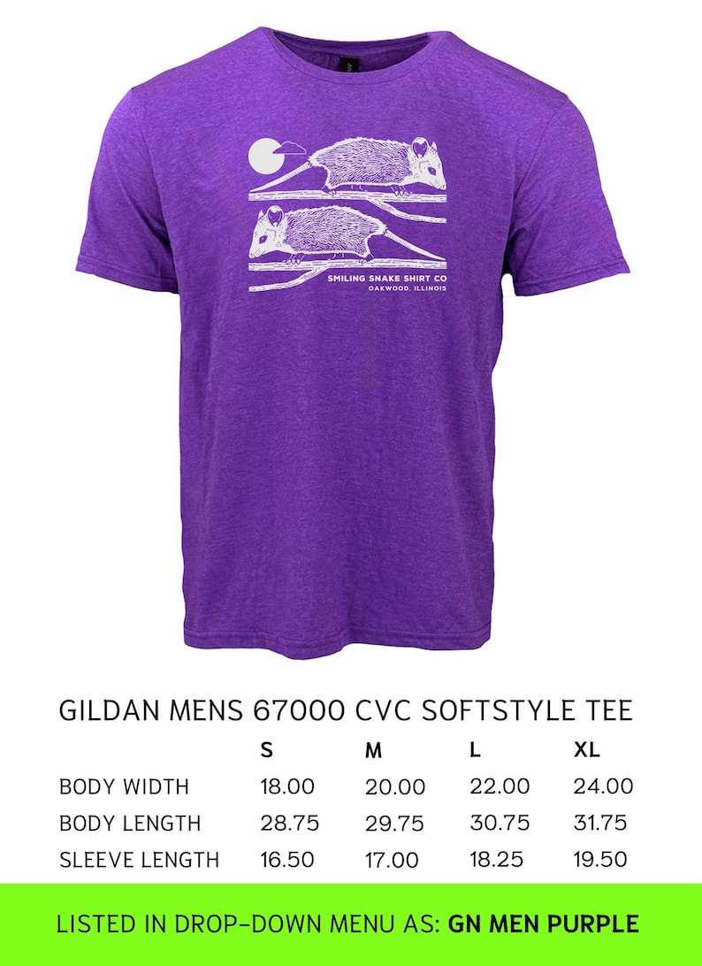 May include: Purple Gildan softstyle tee with a white opossum graphic and text. The shirt has a crew neck and short sleeves. Body width is 45.72 cm (S), 50.8 cm (M), 55.88 cm (L), 60.96 cm (XL). Made by Smiling Snake Shirt Co.