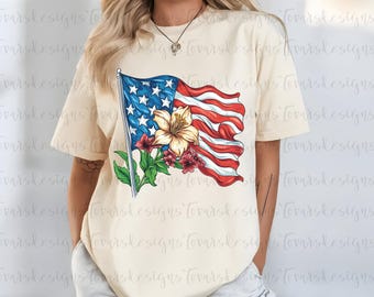 May include: A beige t-shirt with a graphic of an American flag with flowers. The flag is waving in the wind and the flowers are in bloom. The graphic is printed on the front of the shirt.