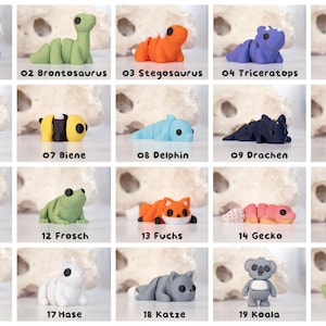 May include: A collection of twenty small, articulated animal and dinosaur figurines in various colors, including a blue T-Rex, green Brontosaurus, orange Stegosaurus, purple Triceratops, brown bear, yellow bee, blue dolphin, black dragon, white unicorn, white polar bear, green frog, orange fox, pink gecko, yellow giraffe, gray shark, white rabbit, gray cat, gray koala, and green crocodile.