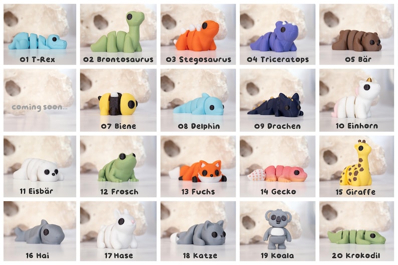 May include: A collection of twenty small, articulated animal and dinosaur figurines in various colors, including a blue T-Rex, green Brontosaurus, orange Stegosaurus, purple Triceratops, brown bear, yellow bee, blue dolphin, black dragon, white unicorn, white polar bear, green frog, orange fox, pink gecko, yellow giraffe, gray shark, white rabbit, gray cat, gray koala, and green crocodile.