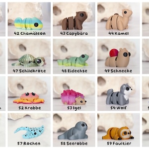 May include: A collection of twenty small, articulated animal figurines arranged in a grid. Each figure features a unique creature design, including an owl, chameleon, capybara, camel, chicken, pug, turtle, lizard, snail, monkey, squid, crab, hedgehog, wolf, pterosaur, starfish, stingray, seal, sloth, and sheep, labeled with numbers 41 through 60.
