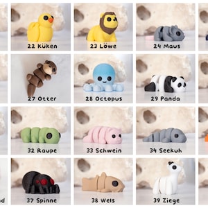 May include: A collection of twenty small, articulated animal figurines labeled 21 through 40. Each figure features a distinct color and shape, including a cow, chick, lion, mouse, narwhal, rhino, otter, octopus, panda, horse, penguin, caterpillar, pig, manatee, shrimp, highland cow, spider, catfish, goat, and elephant.