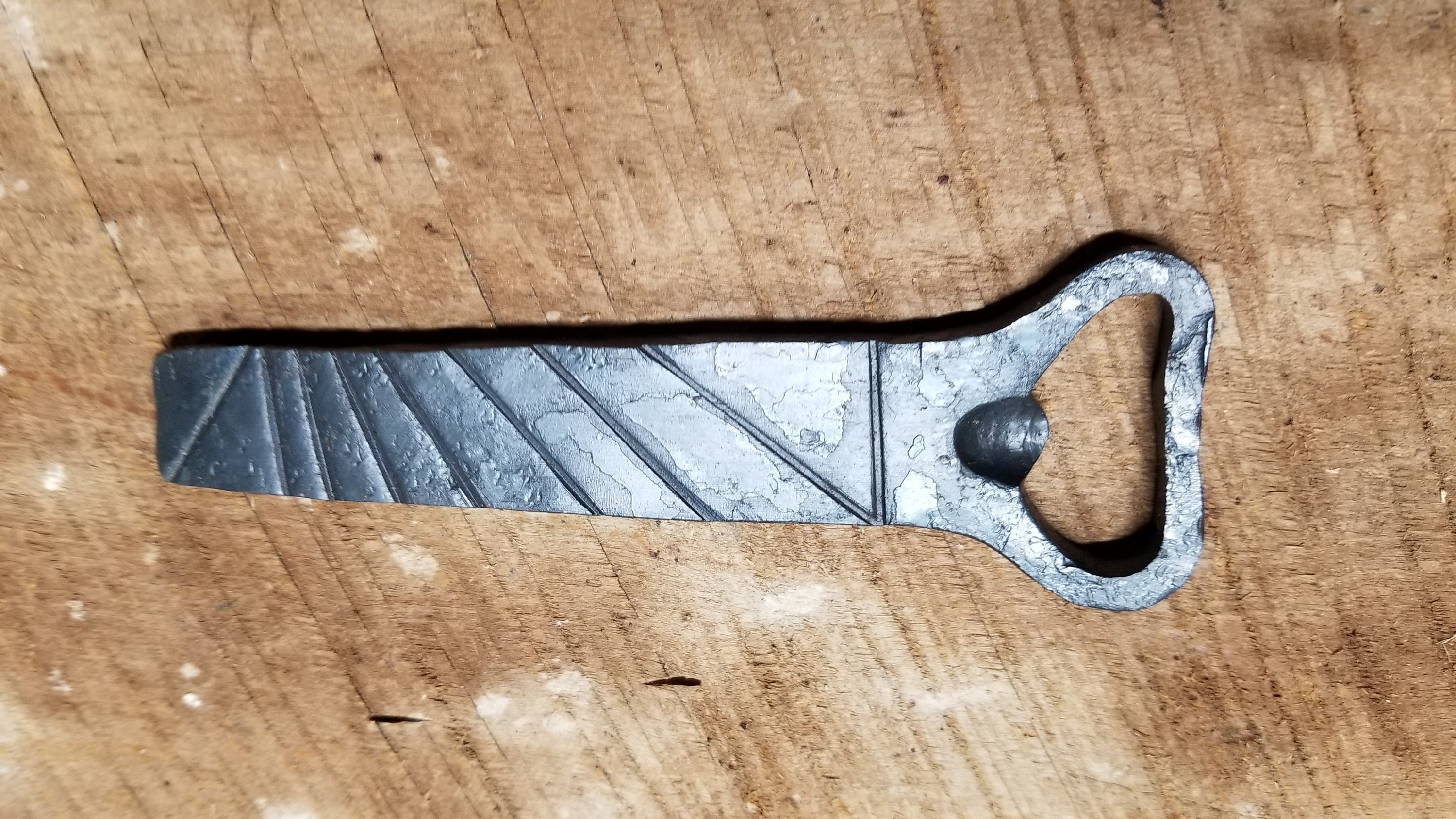 Blacksmithing - Forging a bottle opener 