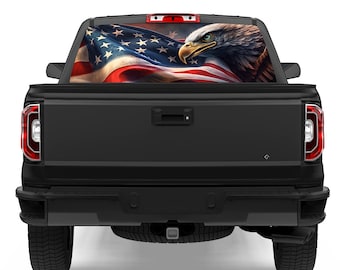 May include: Black pickup truck with a rear window decal featuring an American flag with a bald eagle flying over it.