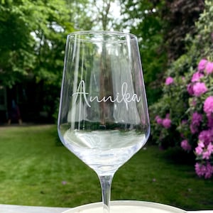 Wine glass engraved with a name