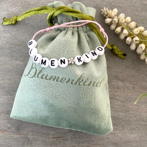 laser-engraved velvet bag for flower girls and bracelet
