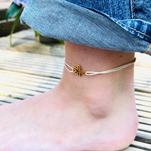 individual anklet on macrame ribbon with starfish