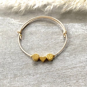Pulsera - color dorado - iniciales y corazón