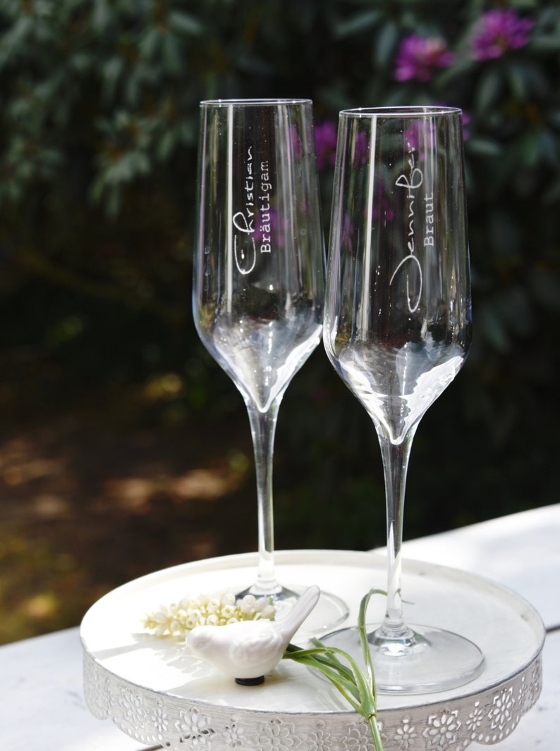 Sparkling wine glasses engraved for the newlyweds Etsy
