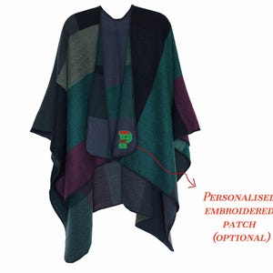 May include: A multi-colored poncho with a patchwork design in shades of teal, purple, and navy. The poncho features a personalized embroidered patch with the letter "P". The text "PERSONALISED EMBROIDERED PATCH (OPTIONAL)" is also visible.
