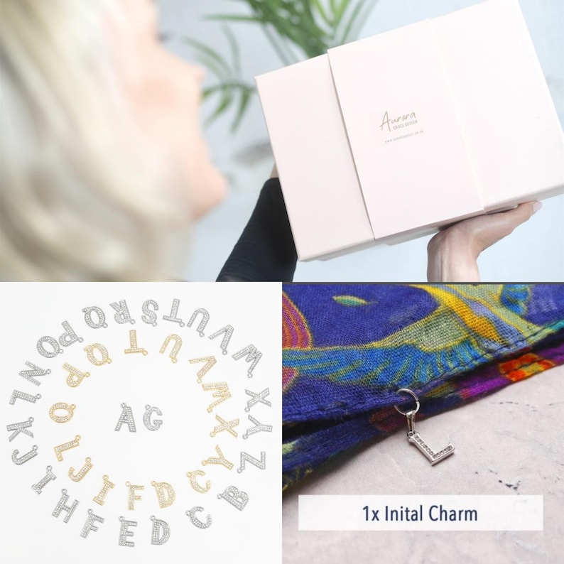May include: A close-up of a silver initial charm in the shape of the letter L, hanging from a blue and yellow patterned scarf. The charm is part of a set of 26 initial charms, shown in a circle around the scarf. The charms are available in silver and gold.