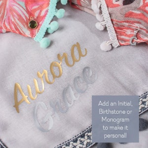 showing the gold and silver monogram options available to personalise this scarf