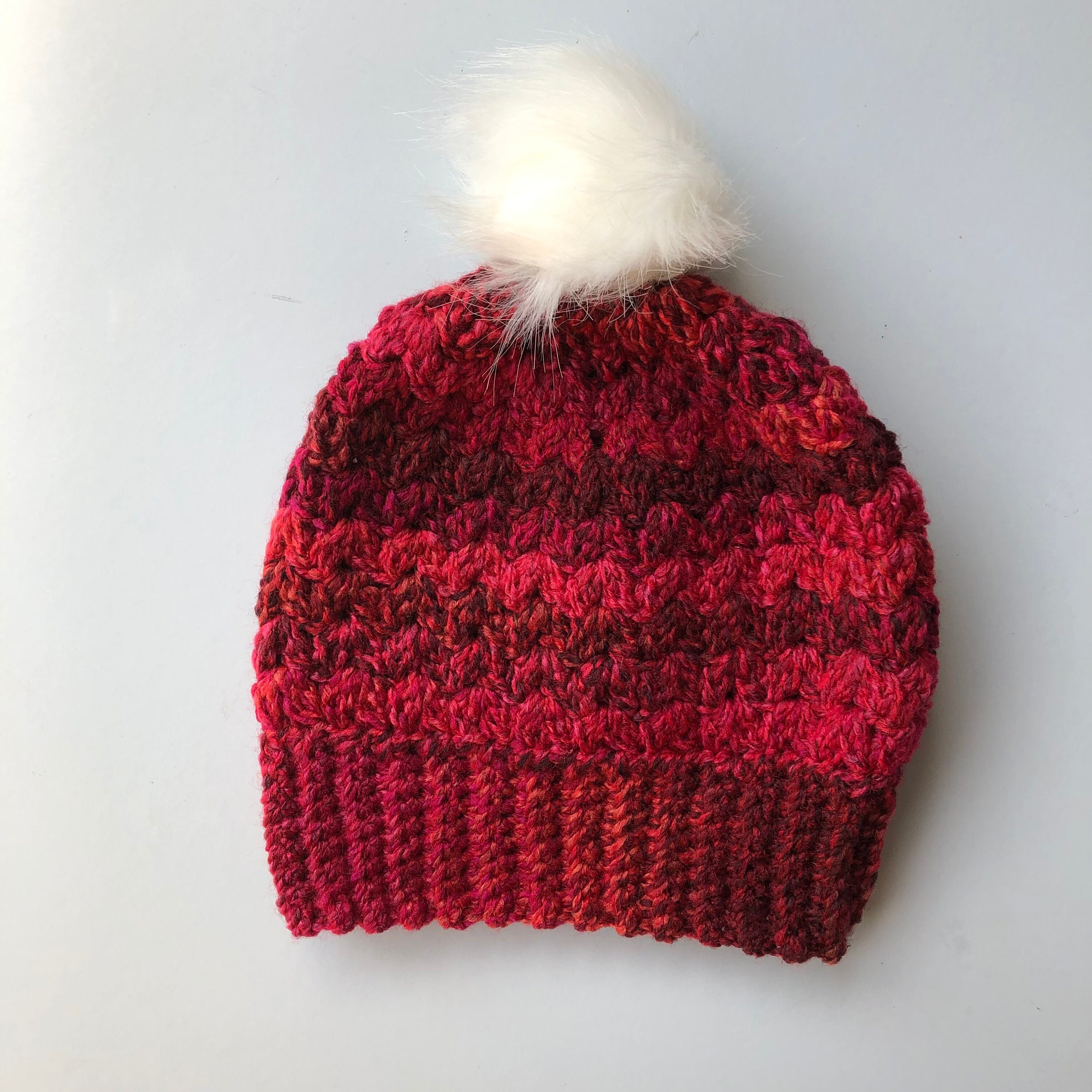 Red and white bobble hat uk sales