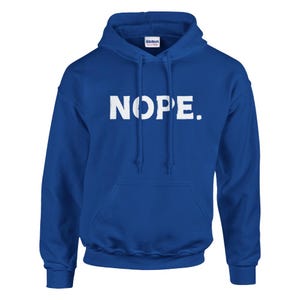May include: Royal blue hooded sweatshirt with the word "NOPE." printed in white on the front.