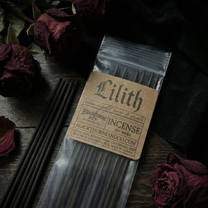 May include: A package of Lilith incense sticks with a brown label, featuring the text "Lilith" and "Blackthorne & Co." The incense is hand-dipped charcoal with notes of night rose and suede. The package contains 10+ sticks.