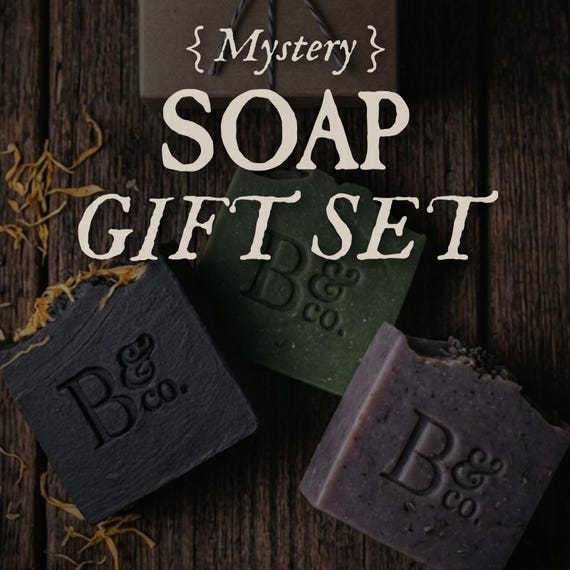 Small-batch gothic soap bars sold as a 'choose your mood' mystery set — vegan, visually striking, and 82 favorites prove the niche audience is real.