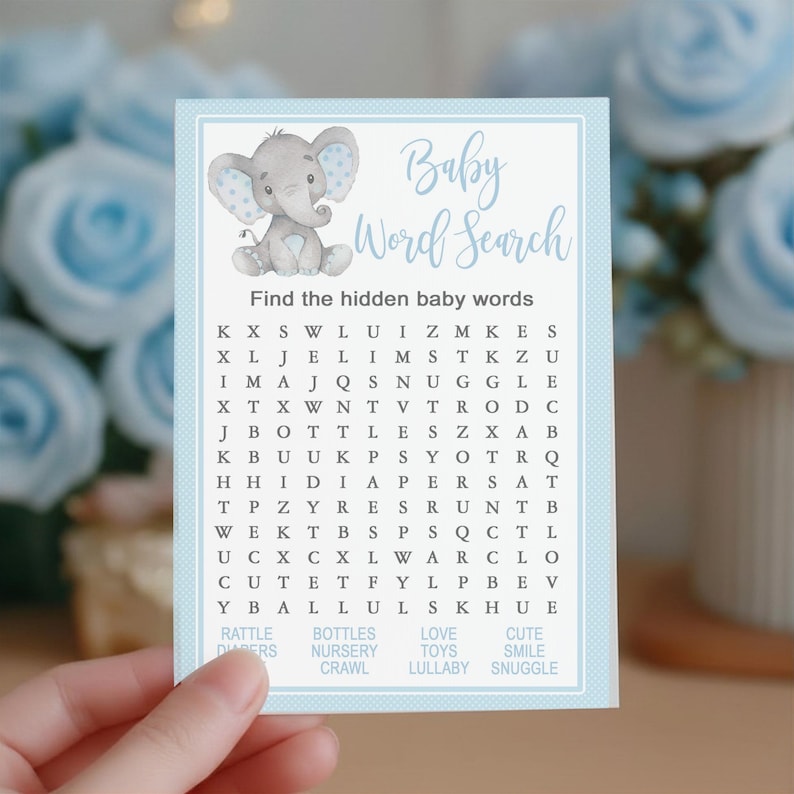 May include: A baby shower game card with a blue border and a light blue background. The card features a cartoon elephant and the words "Baby Word Search". The game is to find hidden baby-related words.