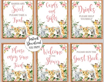 Peut inclure: Six pancartes imprimables pour une fête prénatale sur le thème de la jungle. Les pancartes présentent des fleurs roses, des feuilles vertes et des illustrations d'une girafe, d'un zèbre, d'un lion et d'un éléphant. Les pancartes disent "Les bébés sont doux, prenez un régal", "Cartes et cadeaux", "Boissons, servez-vous", "S'il vous plaît, savourez de la nourriture", "Bienvenue à la fête prénatale", et "S'il vous plaît, signez le livre d'or".