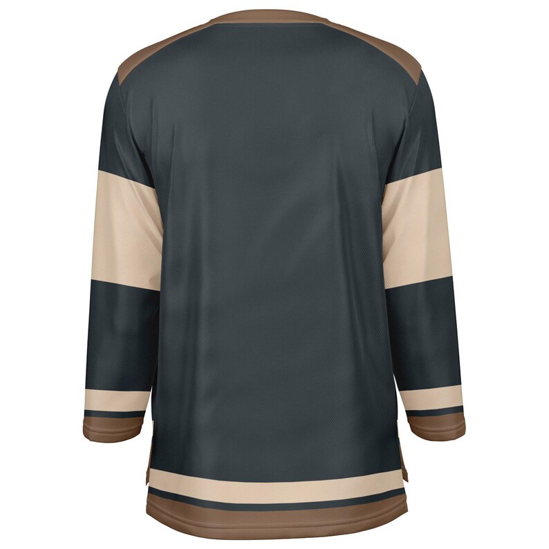 May include: A dark blue hockey jersey with white and brown stripes on the sleeves and bottom. The jersey has a brown collar.