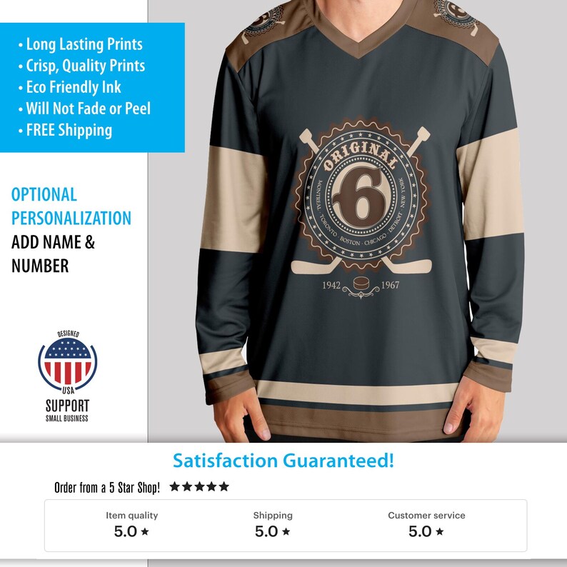 May include: A black and brown hockey jersey with a white stripe across the chest. The jersey has a large circular logo with the word "ORIGINAL" and the number "6" inside. The logo also includes the words "MONTREAL, TORONTO, BOSTON, CHICAGO, DETROIT" and the years "1942" and "1967".
