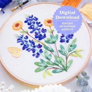 May include: Embroidered hoop art featuring a bouquet of bluebonnet flowers, yellow wildflowers, and a yellow butterfly. The hoop is on a white background with the text "Digital Download instant download pattern".