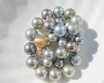 Zwarte Tahitiaanse parelketting 11,2-14,5 mm | AAA | Rond | Lichte grijstinten | 19 inch | Massieve 14K gouden sluiting | Zuidzeeparels