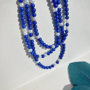 86 cm halsband med lapis lazuli och sötvattenspärlor | 9 karat guld | Blått | 5,5-6 mm | Långt halsband | Två strängar | Vitt | AAA | Ädelsten