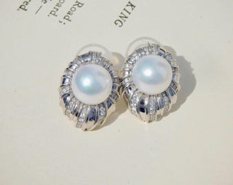 White Gold Plated Sterling Silver Pearl Earrings: Seashell Design