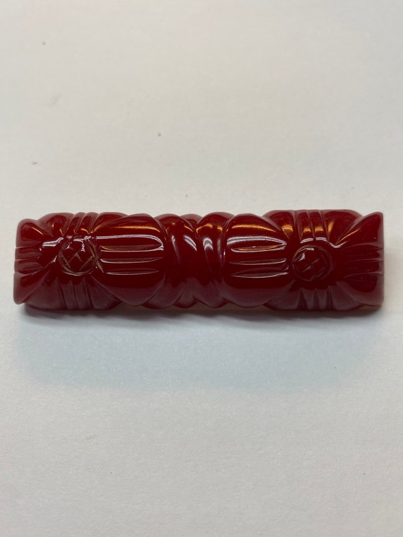 Vintage Red Carved Bakelite Bar Pin